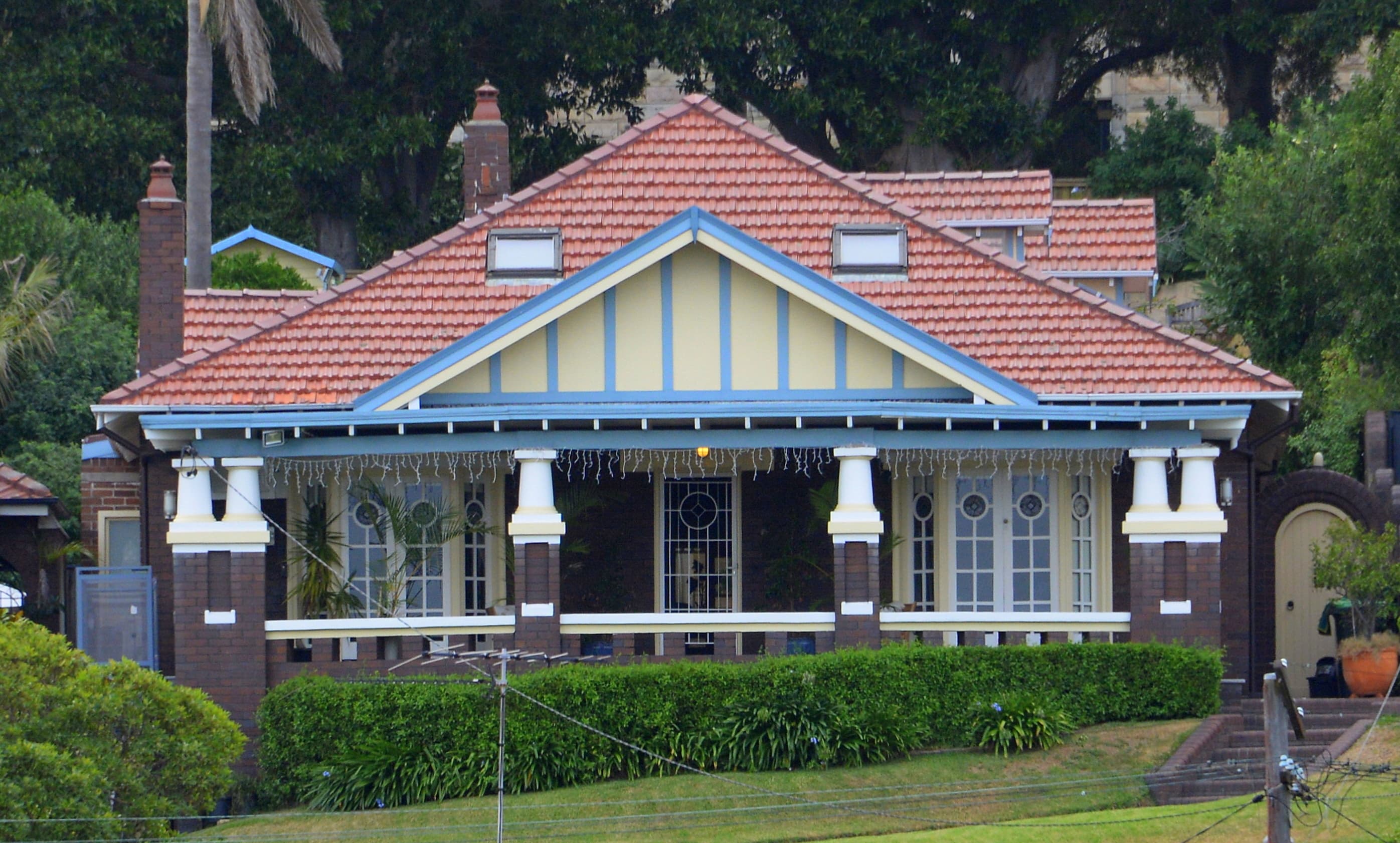 Terms and conditions — illustrative Australian housing or construction photograph, not proof of asbestos